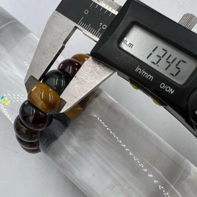 老大爺老貨三色虎眼石圓弧板珠長1.3公分闆諸頭家最愛極度圓融得利益 色美質佳 照片為樣品出貨會嚴格把關 數量有限售完為止